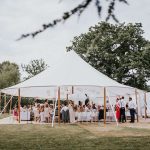 Sailcloth Tent Behind Tree Branch