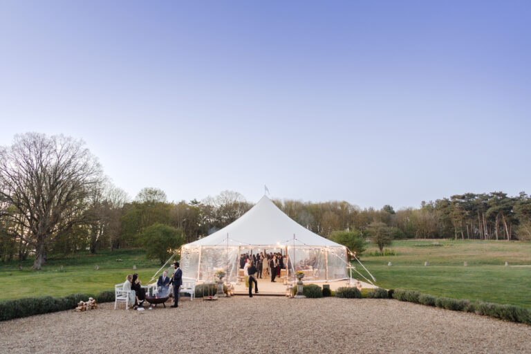 Sailcloth tent with clear sides at a wedding